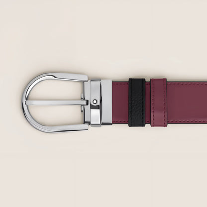 Cintura reversibile montblanc in pelle nera granulata con fibbia a ferro di cavallo in metallo lucido burdeos